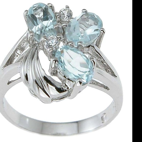 Three Stone Blue Topaz Ring with CZ Accents Rhodium Plated SS